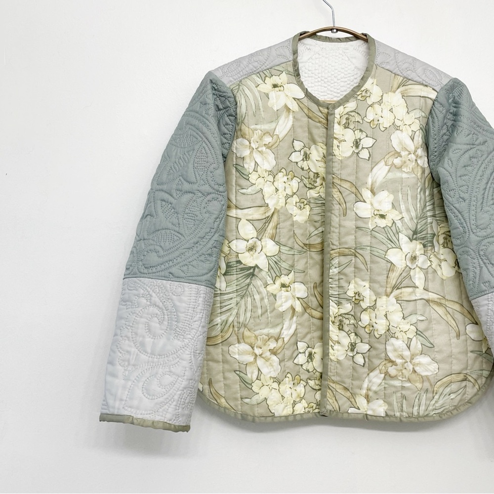Quilted patchwork jacket; handmade from repurposed materials.